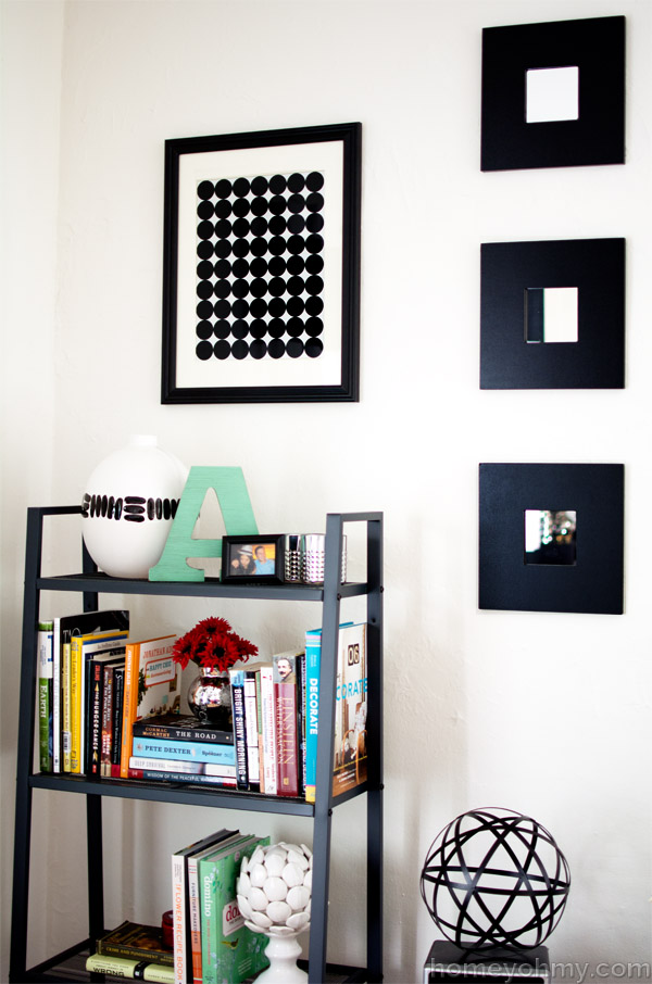 Graphic wall art above bookshelf